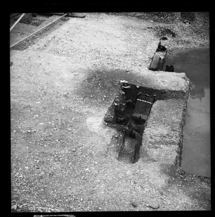 Thumbnail of 56-8 View looking E of Beam B during excavation in Great Ditch II with scale