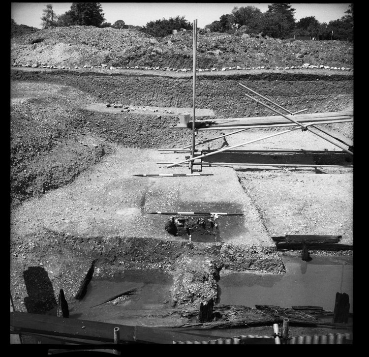 Thumbnail of 57-2 View looking NE of Beams A and B during excavation in Great Ditch II with scale