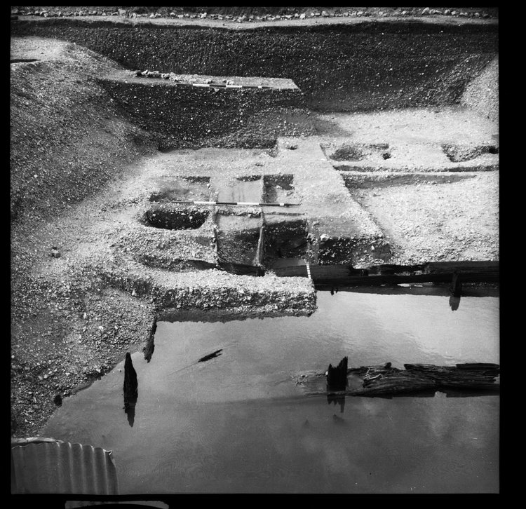 Thumbnail of 58-6 View looking N of Great Ditch II during excavation with scale, including Beams A, B and C