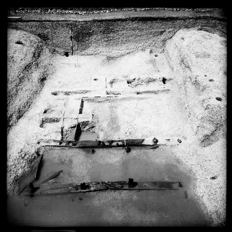 Thumbnail of 61-9 View looking N of GD II fully excavated with scale