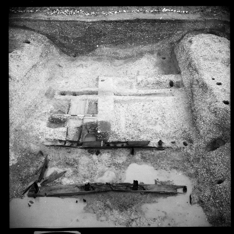 Thumbnail of 62-9 View looking N of GD II fully excavated with scale