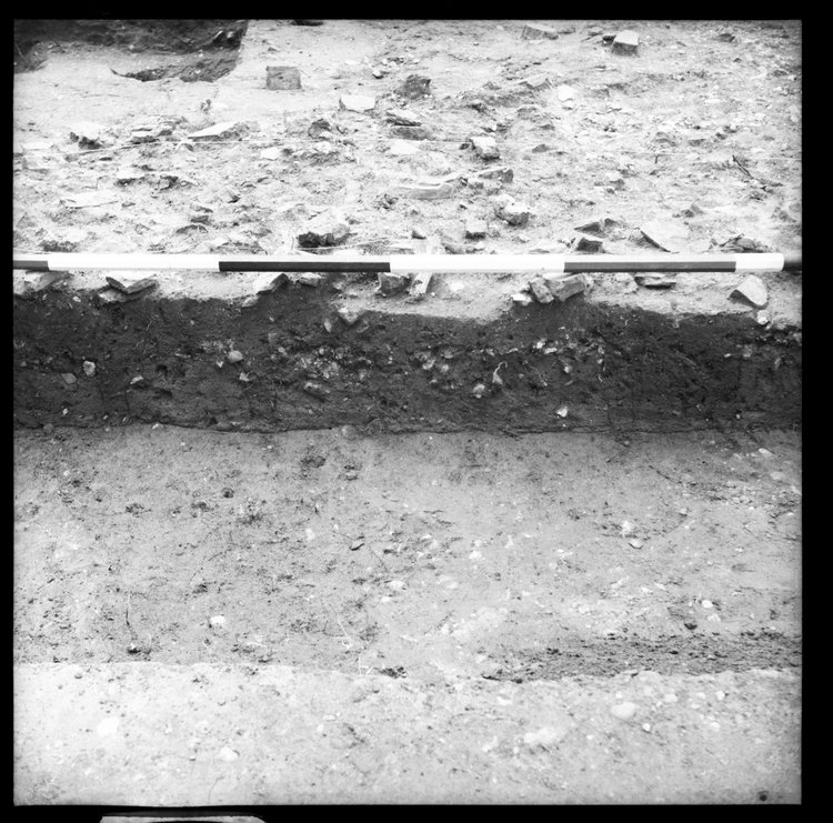 Thumbnail of 63-8 Close up of feature in unknown trench, possibly IDX with scale