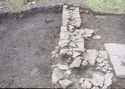 Thumbnail of 1968 photograph showing footings of stone wall, West Front.