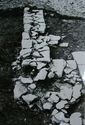 Thumbnail of 1968 black and white photograph showing footings of stone wall on West Front.