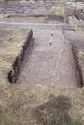 Thumbnail of 1969 photograph of Trench VI on West Front, looking east, showing kerbed and cobbled entranceway.