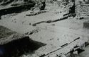 Thumbnail of 1969 black and white photograph of Trench VI on West Front, looking north-east, showing remains of Tower B.