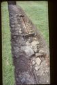Thumbnail of 1972 photograph of Trench B3, Site XXIII (Outer Courtyard), looking north, showing remains of stony feature.