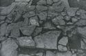 Thumbnail of 1972 black and white photograph of Trench B2, Site XXIII (Outer Courtyard), showing footings of semicircular tower.