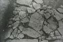 Thumbnail of 1972 black and white photograph of Trench B2, Site XXIII (Outer Courtyard), showing footings of semicircular tower.