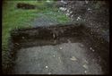 Thumbnail of 1974 photograph of trench in Area B, Site XXIII (Outer Courtyard), showing excavated channel.