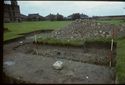 Thumbnail of 1974 photograph of trench in Area B, Site XXIII (Outer Courtyard), looking north-west, showing section of trial trench.