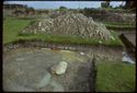 Thumbnail of 1974 photograph of trench in Area B, Site XXIII (Outer Courtyard), looking east, showing excavated trial trench and large stone.