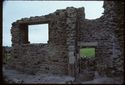 Thumbnail of 1974 photograph of standing building in South Range, looking north, showing window and doorway.
