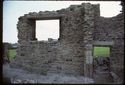 Thumbnail of 1974 photograph of standing building in South Range, looking north, showing window and doorway.