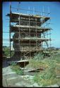 Thumbnail of 1975 photograph showing scaffolding on structure in South Range.