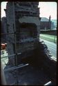 Thumbnail of 1975 photograph, looking east, showing chimney and scaffolding on buildings at South Range.