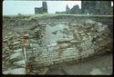 Thumbnail of 1976 photograph of Site XIII (Inner Courtyard), looking east, showing window embrasures in the third room behind Tower A.