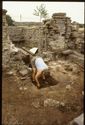Thumbnail of 1990 photograph showing excavation of interior of Crucks Building, with walls and separate rooms visible.