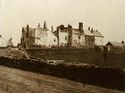 Thumbnail of 1864 sepia photograph of buildings at South Range.