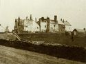 Thumbnail of 1864 green-tinted black and white photograph showing buildings at South Range.