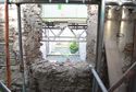 Thumbnail of North wall, first floor. Left of the left-hand brick jamb is the side of an older stone window