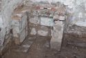 Thumbnail of A later structure for a stone shelf or a sink, at the north-west corner of the ground floor