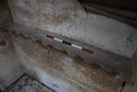 Thumbnail of The remains of the shotgun rack in the upper window of the west wall