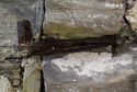 Thumbnail of Detail of the upper pintle on the north side, showing how the stones have been forced apart by rust-jacking