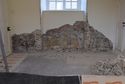Thumbnail of The north wall of the same room has a section of the old arch in its window recess and sections of the vault at either side