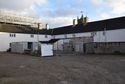 Thumbnail of The north face of the range at the start of plaster-stripping, after demolition of the lean-to rooms at the rear of nos. 15 and 16