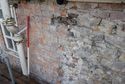Thumbnail of This short section of wooden lintel I may be the remains of a former window