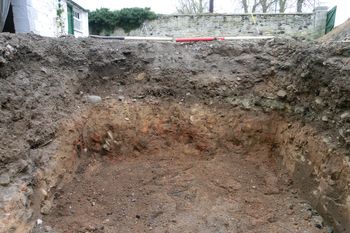 Archaeological Watching Brief, Cornhill House: West facing baulk of firepit 