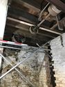 Thumbnail of SE corner of north bay. Suspended belt drive counter shafts and wheels. Facing SE