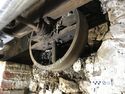 Thumbnail of Belt-drive wheel of laminated wood on the easternmost counter shaft. Facing NW
