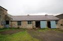 Thumbnail of North facing shot of the southern elevation of Barn A taken from the courtyard (2m scale)
