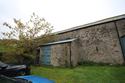 Thumbnail of South-west facing shot of the eastern elevation of Barn B including 20th century lean to (2m scale)