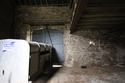 Thumbnail of East facing shot of the threshing part of Barn B showing the barn door (2m scale)