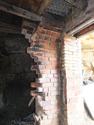 Thumbnail of cantilevered brick courses and blackened bricks