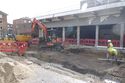 Thumbnail of Working shot of excavating concrete in trenches, viewed from the North West