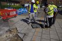 Thumbnail of Working shot of inspecting utilities prior to excavation