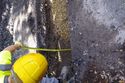 Thumbnail of Working shot of taking measurements of trench