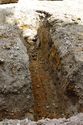 Thumbnail of Post excavation shot of Trench 7, viewed from the North East. 1x1m scale
