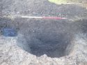 Thumbnail of View to SW trench 1 S.100 oit or possible well [103] 1x1m scale