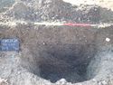 Thumbnail of View to SW trench 1 S.100 pit / well [103] 1x1m scale
