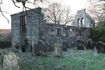 NE facing walls with graves