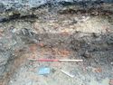 Thumbnail of South-west facing section of trench 1 (1m scale)