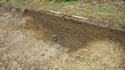 Thumbnail of Oblique shot of baulk section of enclosure ditch [157]