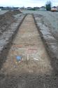 Thumbnail of South-west facing shot of Trench 8 (1m x 1m scale)