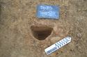 Thumbnail of North-west facing shot of posthole [105] (0.2m scale)