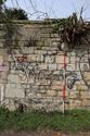 Thumbnail of S. face showing later ashlar western section of wall. West of and overlapping with 4437, view N, 2m.